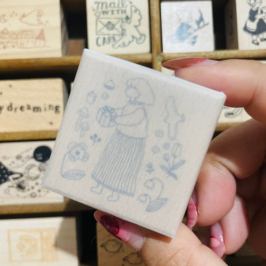 Ivy Snow Giving Wood Stamp