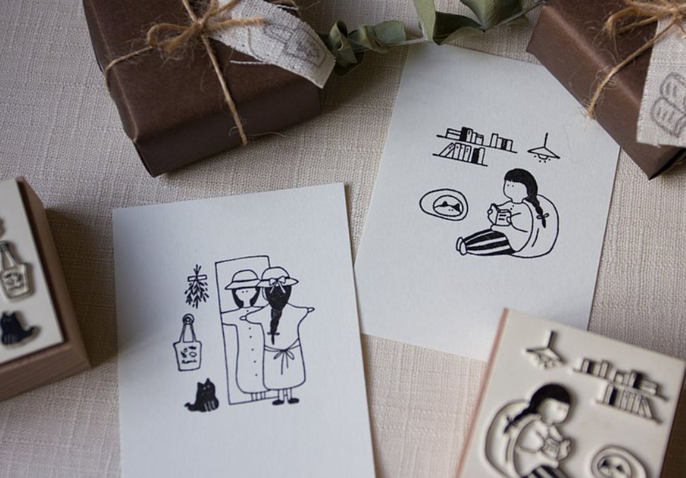 Ivy Snow Looking in the Mirror and Reading Wood Stamp